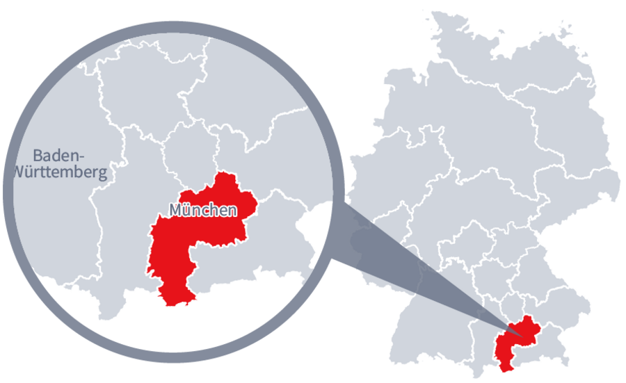 Diese Grafik zeigt eine Karte von Deutschland mit einer detaillierten Ansicht der Region München. München ist in Rot hervorgehoben und liegt im südlichen Teil Deutschlands. Ein Lupensymbol vergrößert diesen Bereich, um die Lage genauer darzustellen. 